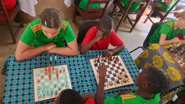 Students playing chess